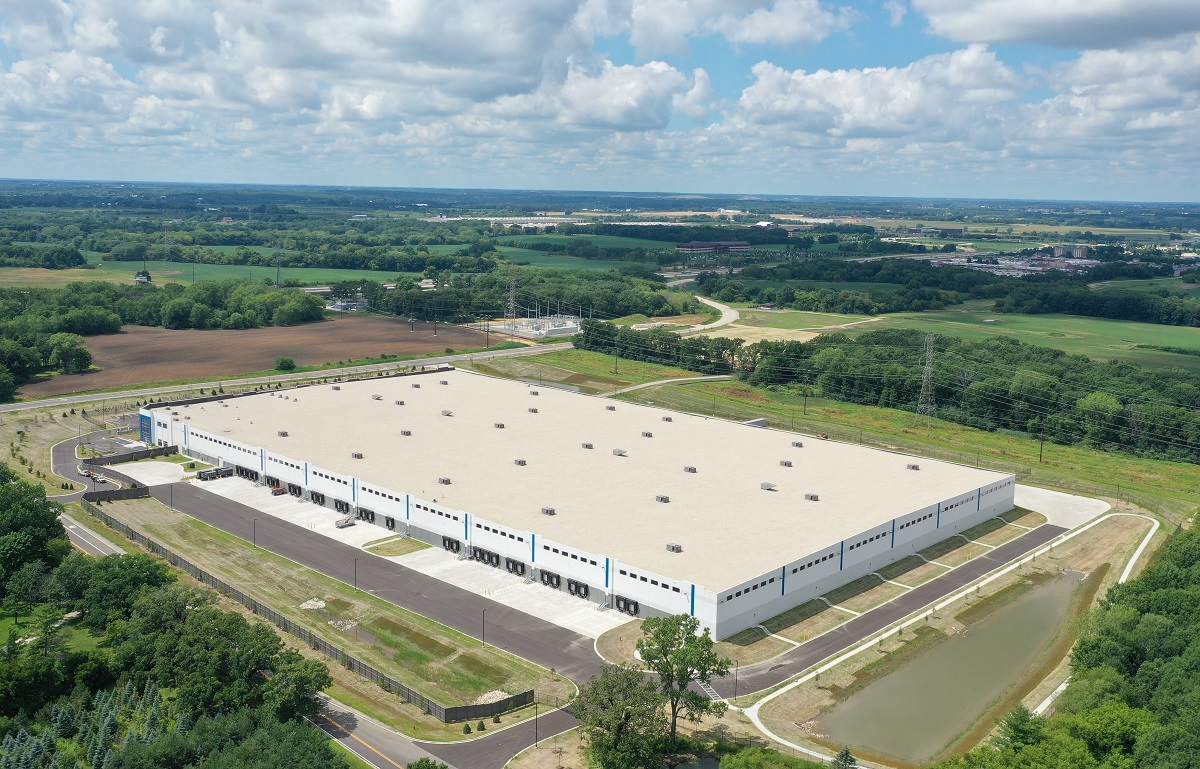 Stateline 94 site with warehouse in rural green setting, aerial