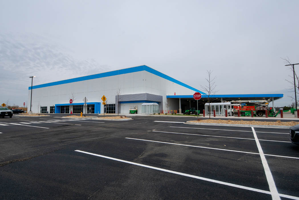 Crossroads 55 industrial property featuring modern architecture and ample parking space.