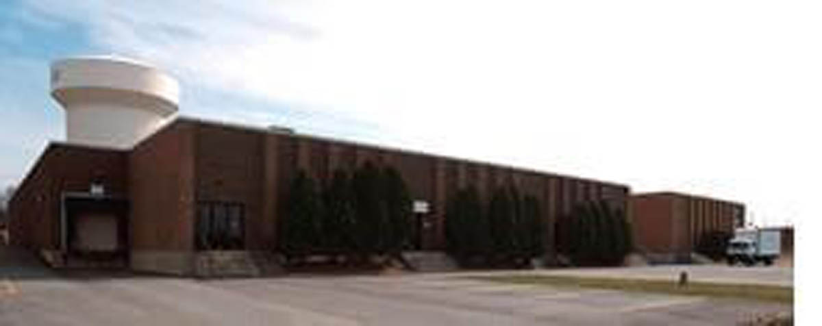 Woodland Foods warehouse and water tower, sale-leaseback by Venture One